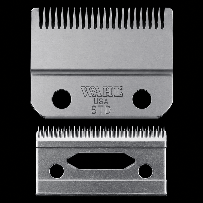 Two Wahl hair clipper blades on a black background