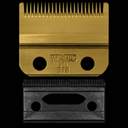 Gold and black clipper blade with 'Wahl USA STD' branding on a black background