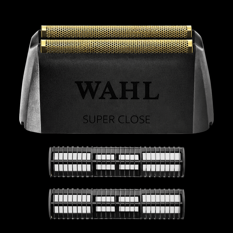 Wahl hair trimmer with multiple cutting heads on a black background