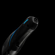 Wahl Vapor cordless clipper bottom angle showing charging port and blue LED. Primos Barber Supply