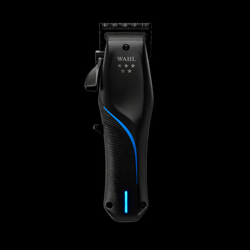 Wahl Vapor cordless professional hair clipper front view with blue LED on black background. Primos Barber Supply